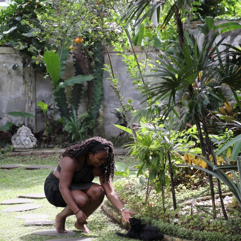 Crystal with her cat in the garden